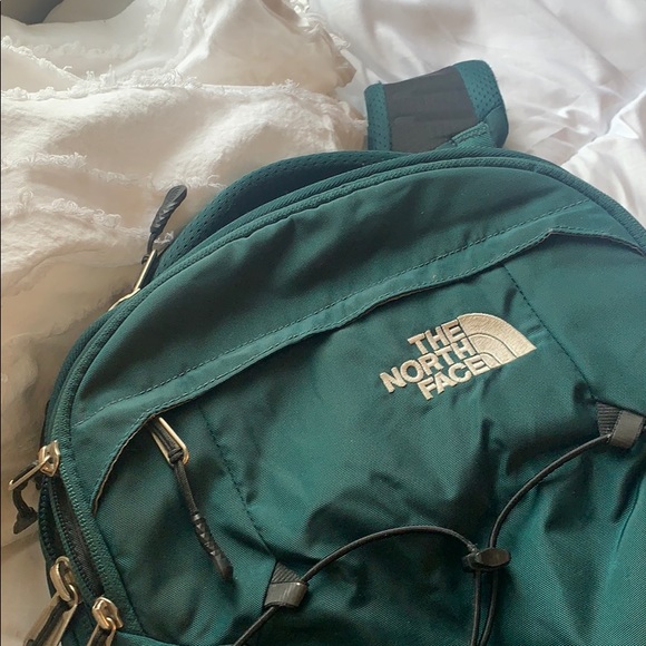 dark green north face backpack